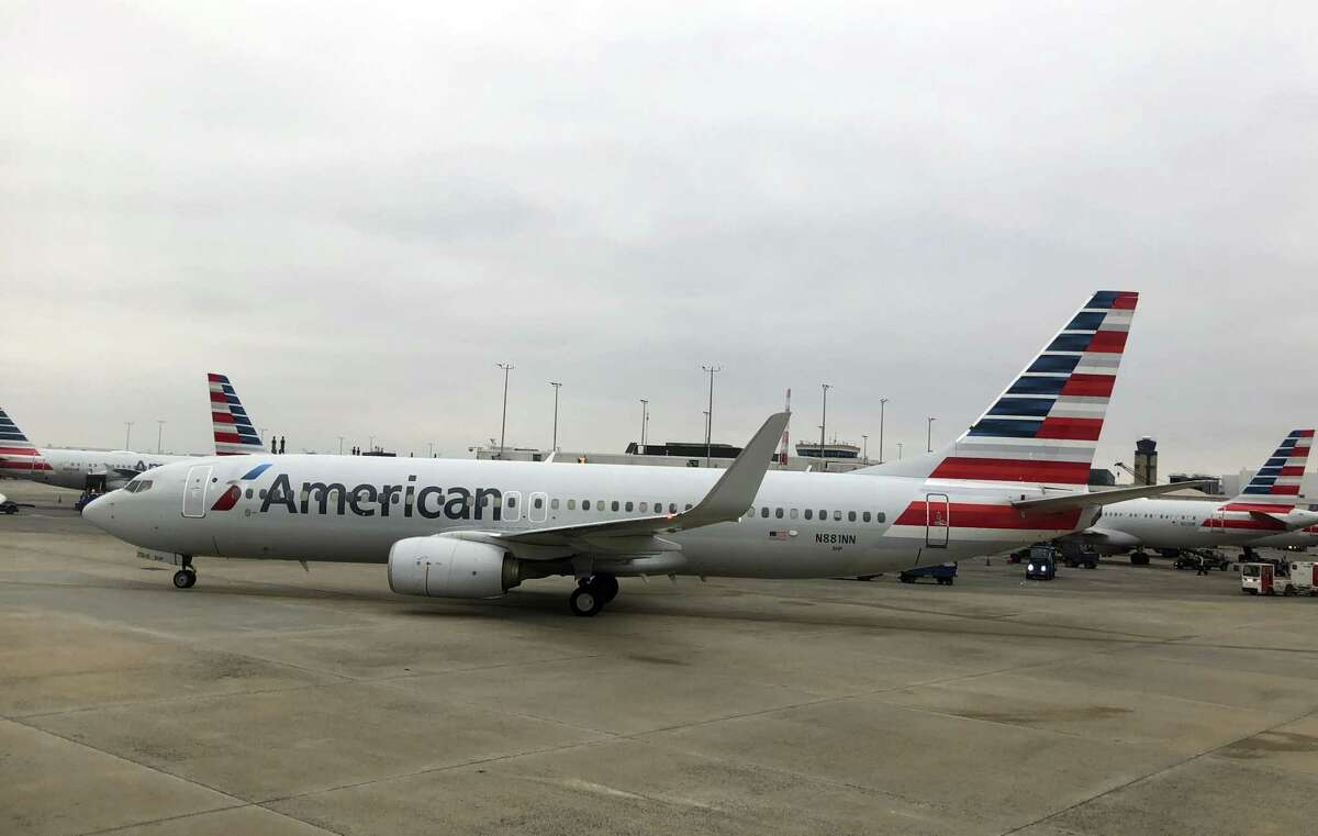 (FILES) In this file photo taken on February 17, 2019 an American Airlines plane is seen at Charlotte International Airport in Charlotte, North Carolina. - American Airlines on October 9, 2019 pushed back the return of its Boeing 737 MAX jets until January 2020, again reshuffling its schedule due to a grounding following two deadly crashes.The US carrier now plans for the MAX to resume flights on January 16, 2020. The previous plan had been to bring the planes back into service on December 3. (Photo by Daniel SLIM / AFP) (Photo by DANIEL SLIM/AFP via Getty Images)