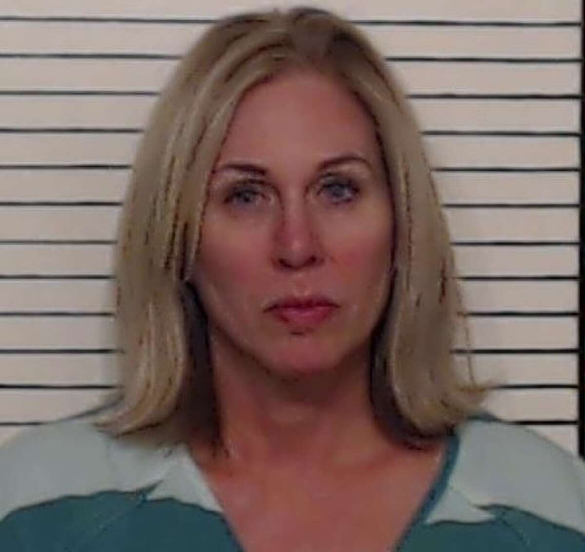 Dena Welch, 50, was charged with driving while intoxicated after police said she crashed into two New Braunfels Police vehicles on Tuesday morning.