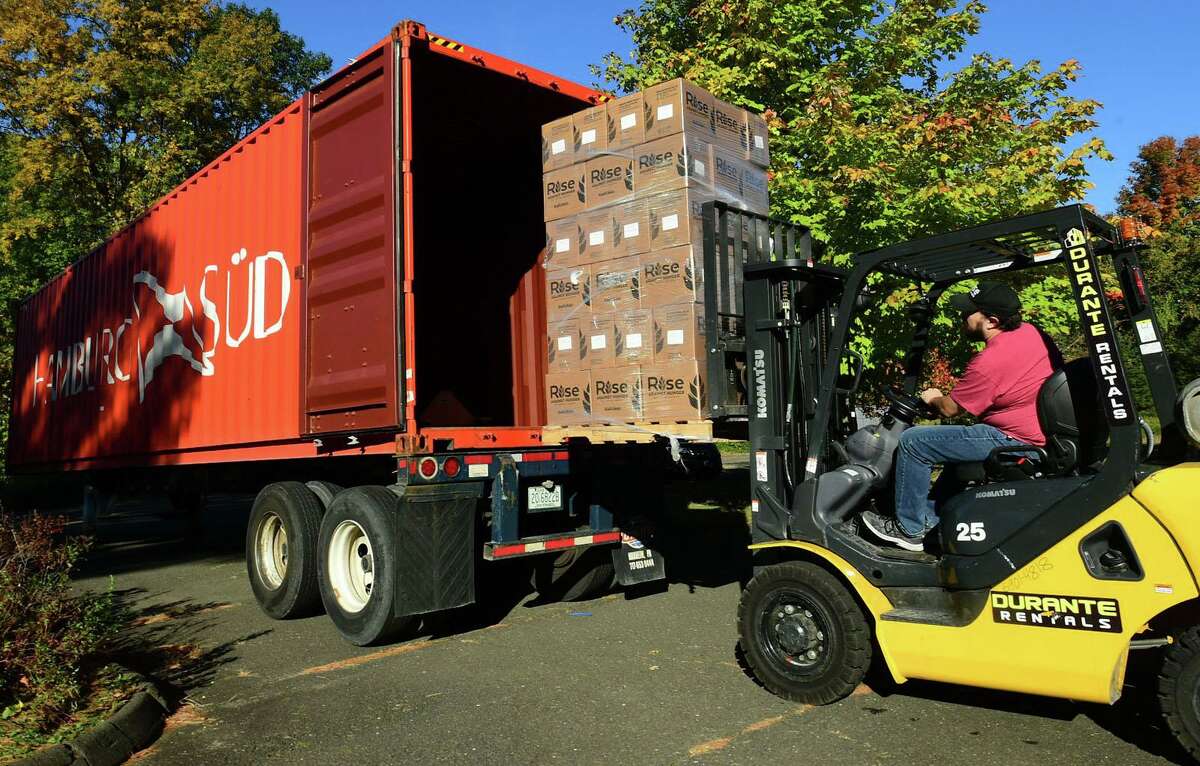 Rise Against Hunger Community Engagement Coordinator David Barletta helps hundreds of volunteers package and load meals for Wilton’s Wi-ACT Interfaith Committee the 6th annual Rise Against Hunger meal packaging event Saturday, October 19, 2019, at Wilton Presbyterian Church in Wilton, Conn. Four shifts of nearly 750 volunteers will load a shipping container destined for Somalia with the completed meals.