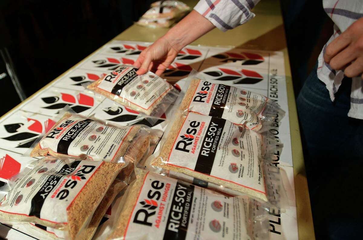 Hundreds of volunteers package meals for Wilton’s Wi-ACT Interfaith Committee the 6th annual Rise Against Hunger meal packaging event Saturday, October 19, 2019, at Wilton Presbyterian Church in Wilton, Conn. Four shifts of nearly 750 volunteers will load a shipping container destined for Somalia with the completed meals.