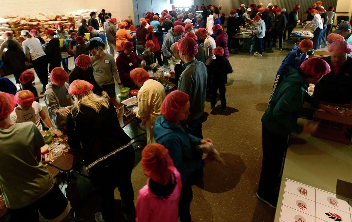 Hundreds of volunteers package meals for Wilton’s Wi-ACT Interfaith Committee the 6th annual Rise Against Hunger meal packaging event Saturday, October 19, 2019, at Wilton Presbyterian Church in Wilton, Conn. Four shifts of nearly 750 volunteers will load a shipping container destined for Somalia with the completed meals.