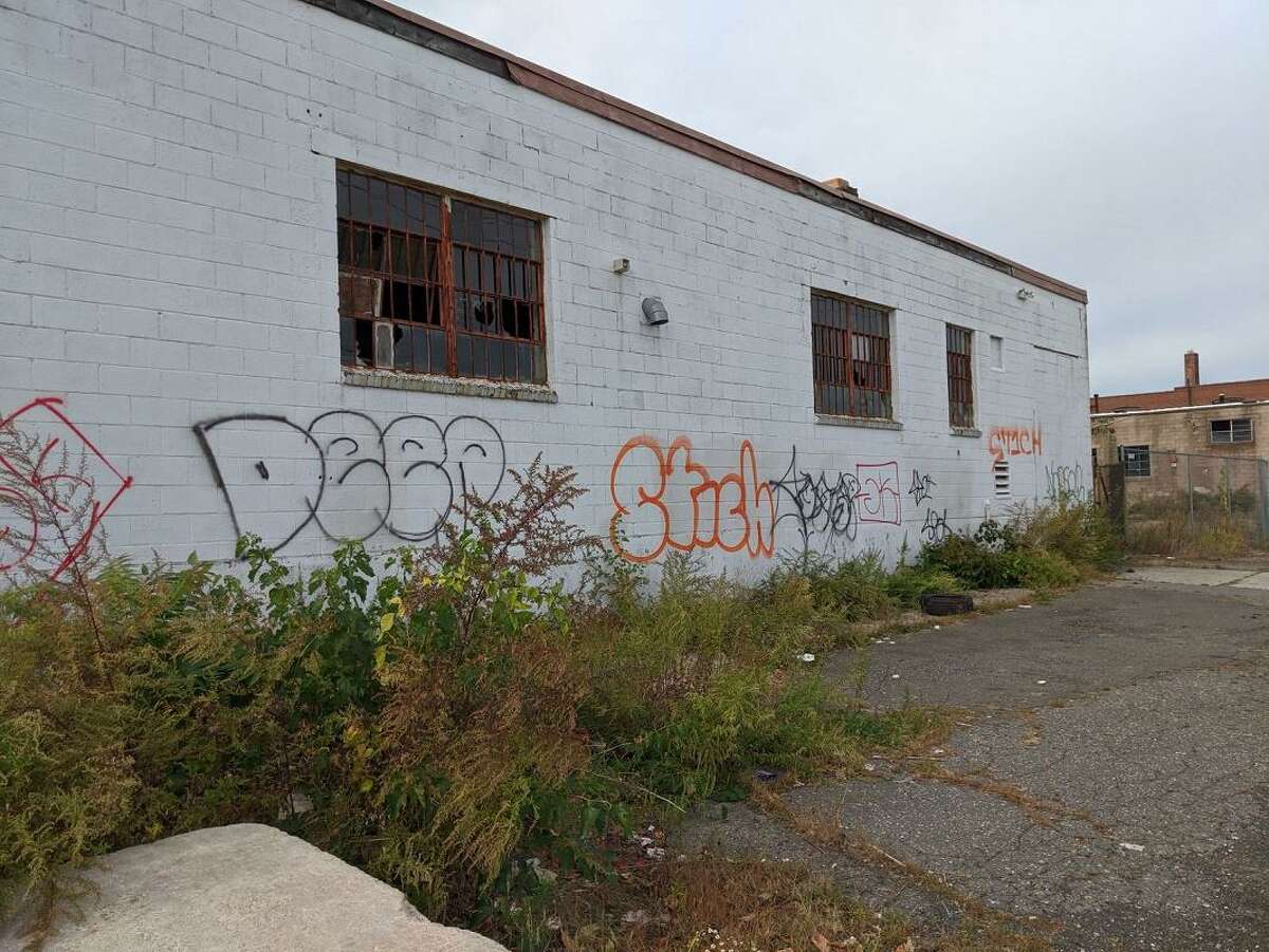 A vacant house on part of The Haven site. Neighbors have complained about graffiti, broken windows, boarded fences, fires and squatters near the planned development.