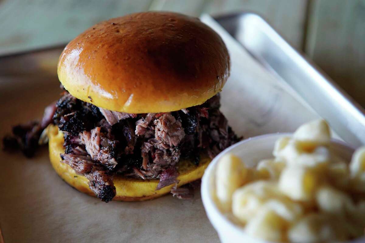 Chopped brisket sandwich with a side of mac and cheese at Blood Bros. BBQ.