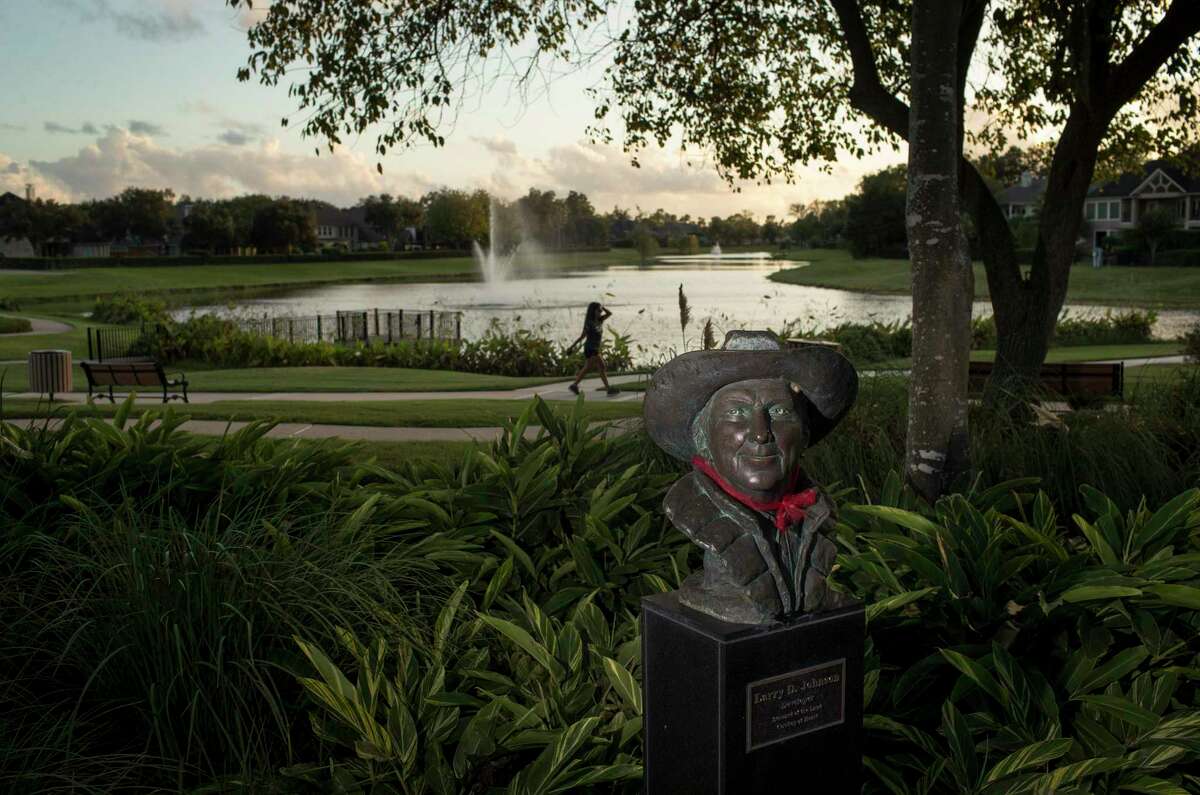 A bust of Larry Johnson is photographed at a history park in Sienna Plantation on Thursday, Oct. 10, 2019, in Missouri City. According to signs at the park, the land that became Sienna Plantation was originally part of Stephen F. Austin's "Old Three Hundred" colony. By 1860, the area became the Waters Plantation, named for Jonathan D. Waters, slave labor was used to produce sugar, cotton and other crops. Waters at one point became the wealthiest man in Fort Bend County and one of the largest slave owners. From 1875-1911, the plantation, under different ownership, depended on leased convict labor, former slaves and wage workers.