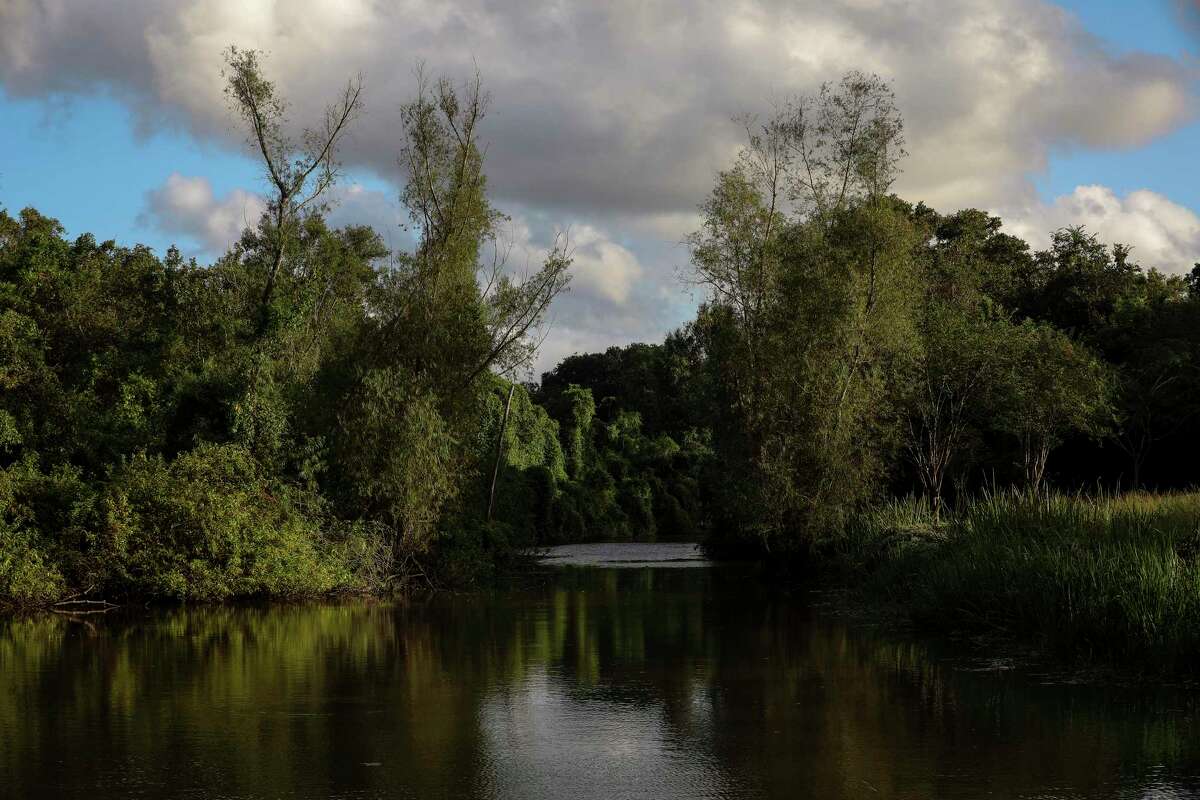 The sun sets over Oyster Creek, in the Sienna Plantation community, on Thursday, Oct. 10, 2019, in Missouri City.