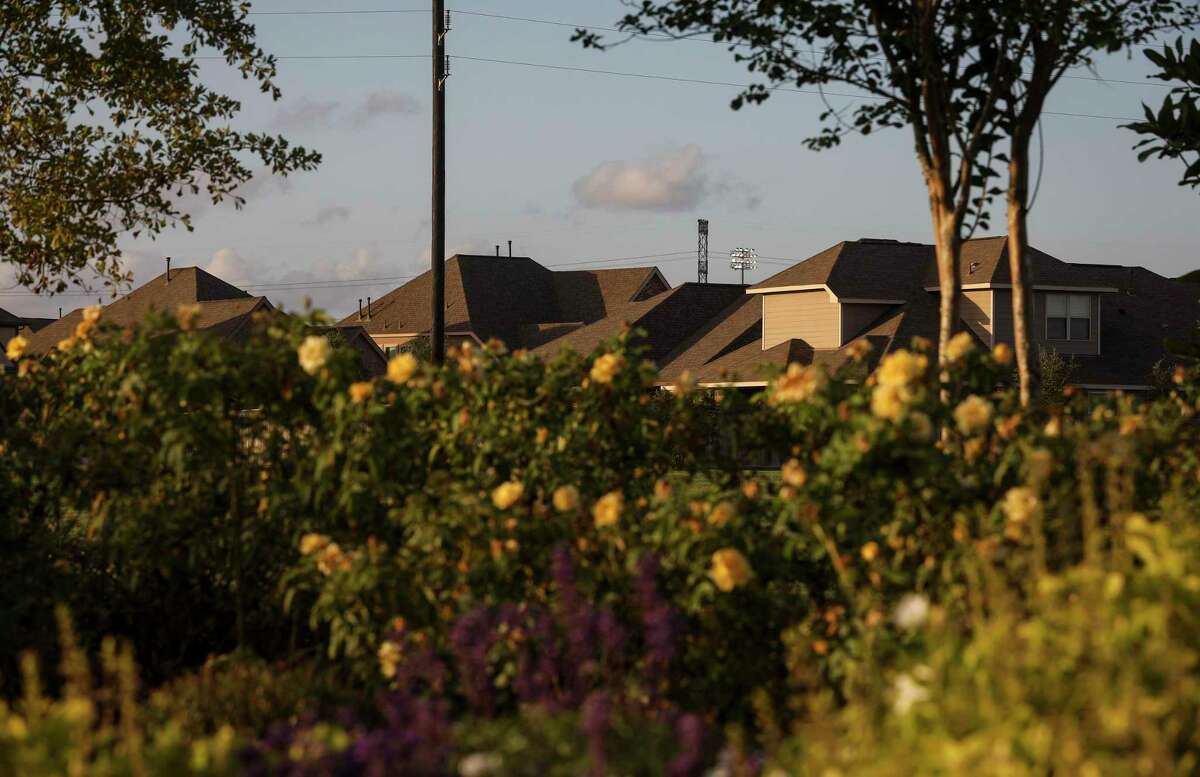 The sun sets over the Sienna Plantation community on Thursday, Oct. 10, 2019, in Missouri City.