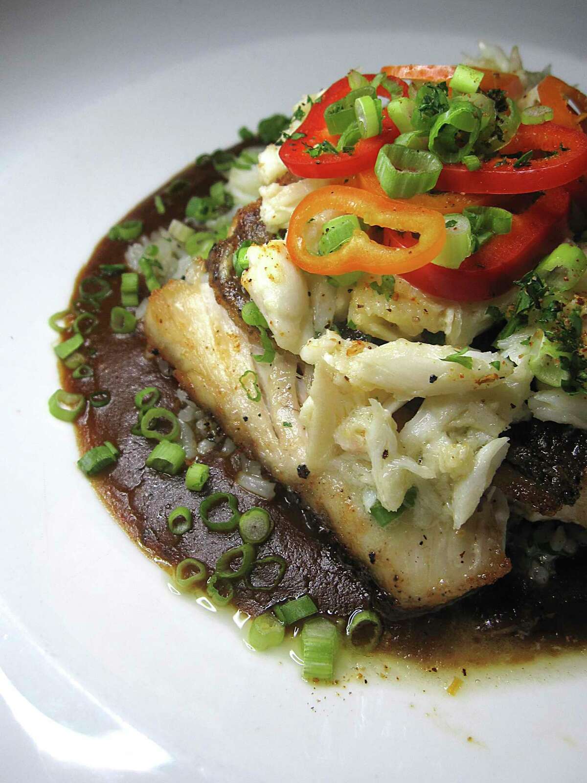 Pan-fried Gulf snapper comes with gumbo sauce and an optional dress of crab meat at Southerleigh Fine Food & Brewery at the Pearl.