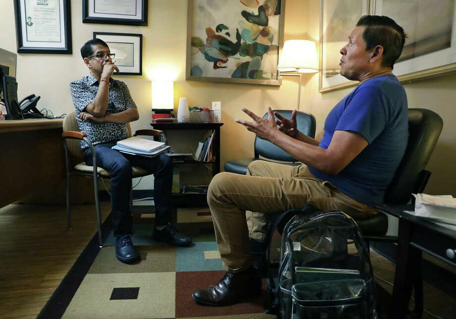 Steven Finees Flores, 52 years old, right, meets with Francisco Ramirez, a counselor at the San Antonio Aids Foundation, for a therapy appointment. / ©2019 San Antonio Express-News