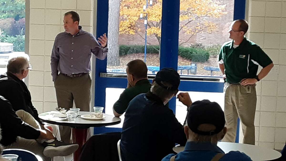 Midland High assistant football coach Matt Starling, left, and Dow High head football coach Jason Watkins spoke at Wednesday's monthly Midland sports luncheon at Northwood, which focused on Friday's upcoming 50th annual Midland vs. Dow rivalry football game at Midland Community Stadium.