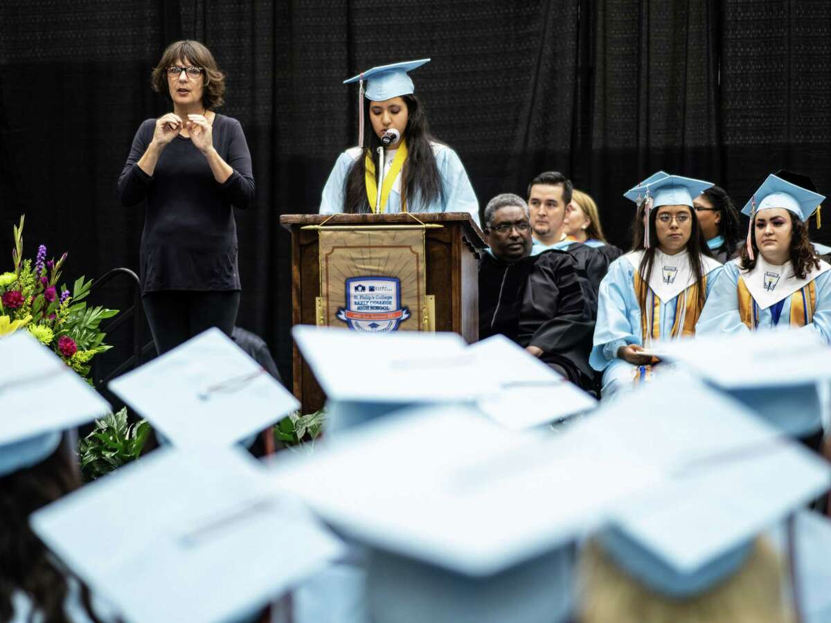 Izabella Monreal gives her valedictory speech at the graduation of St. Philip's Early College High School last June. The Alamo Colleges will study potential new partnerships in an expansion of early college high schools in several school districts.