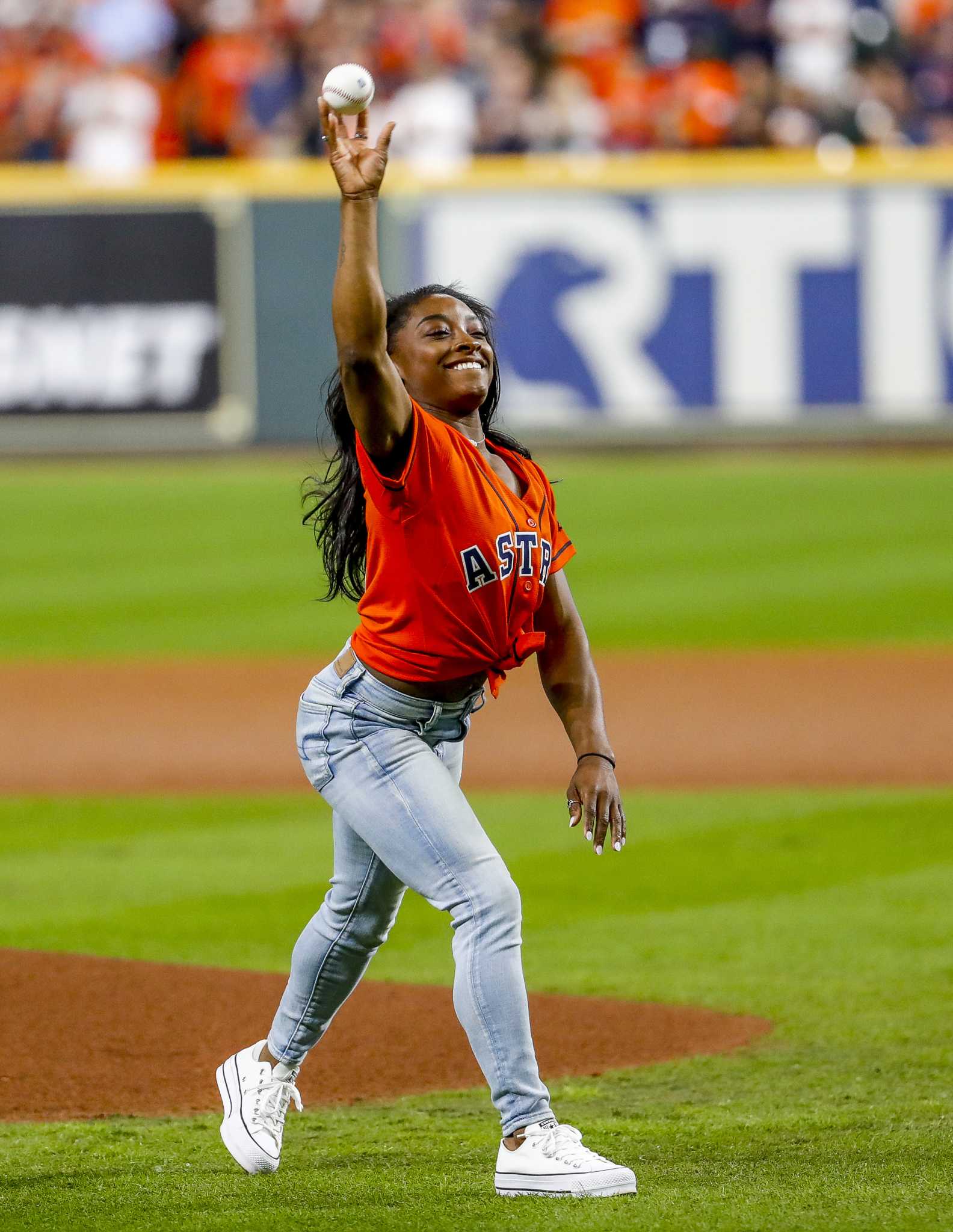 Flipping out! Simone Biles' World Series opening pitch goes viral