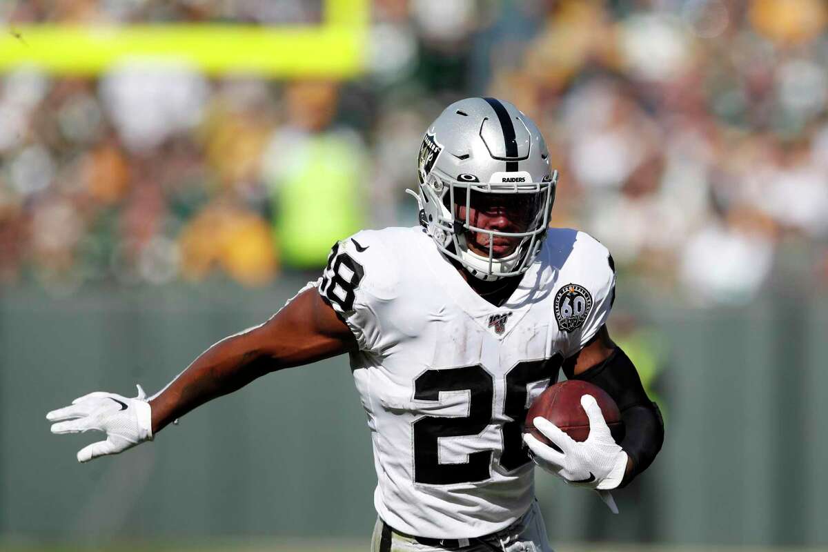 Packers score six TDs in 42-24 win over Raiders