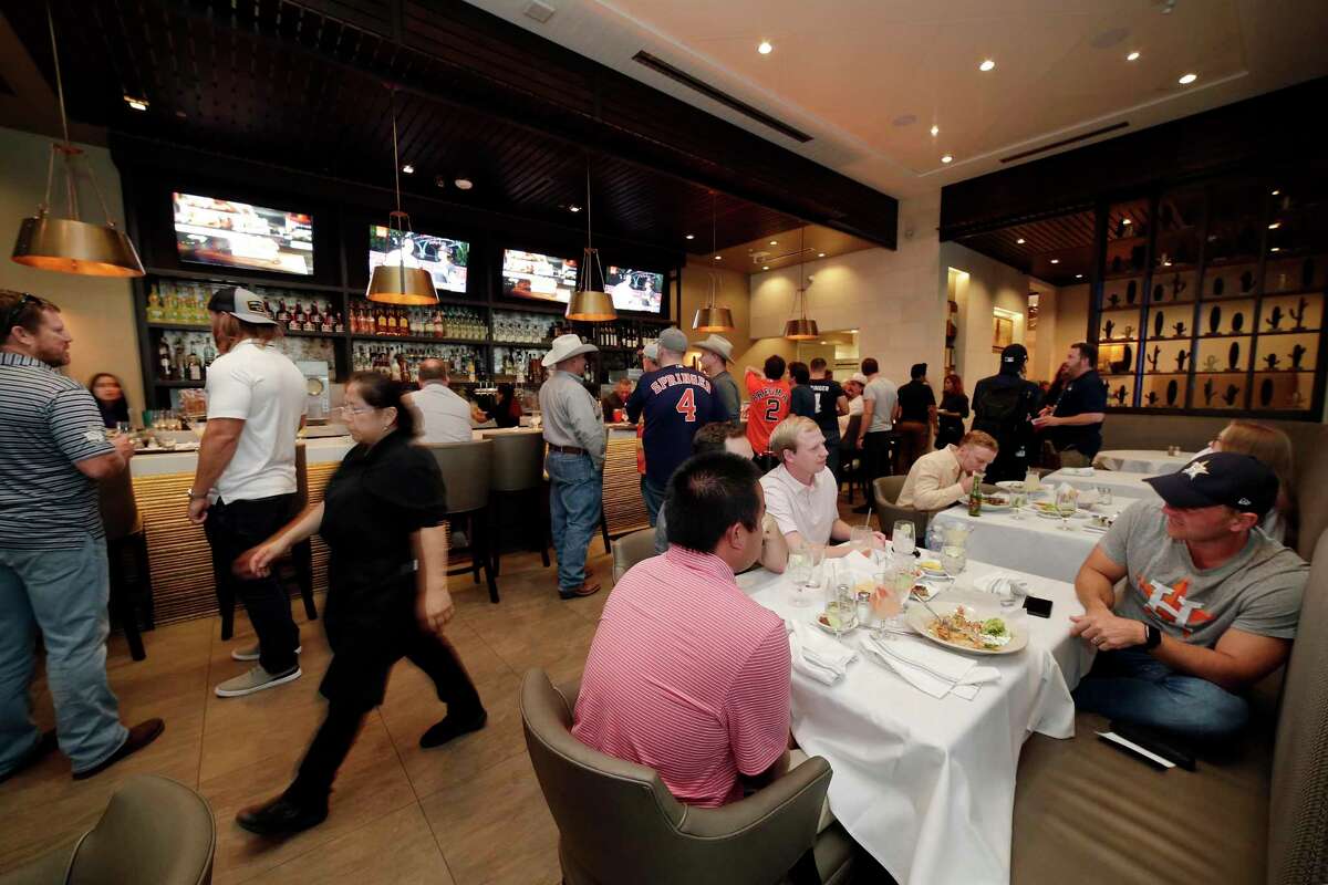 Customers hang out in the lounge at Irma's Southwest.