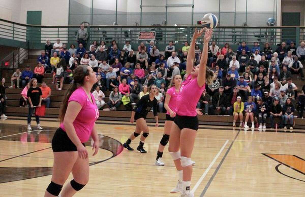Morley Stanwood's Landrie LaPreze sets the ball for Ryleigh Newton during the Mohawks' victory over White Cloud on Wednesday night. (Pioneer photo/Joe Judd)