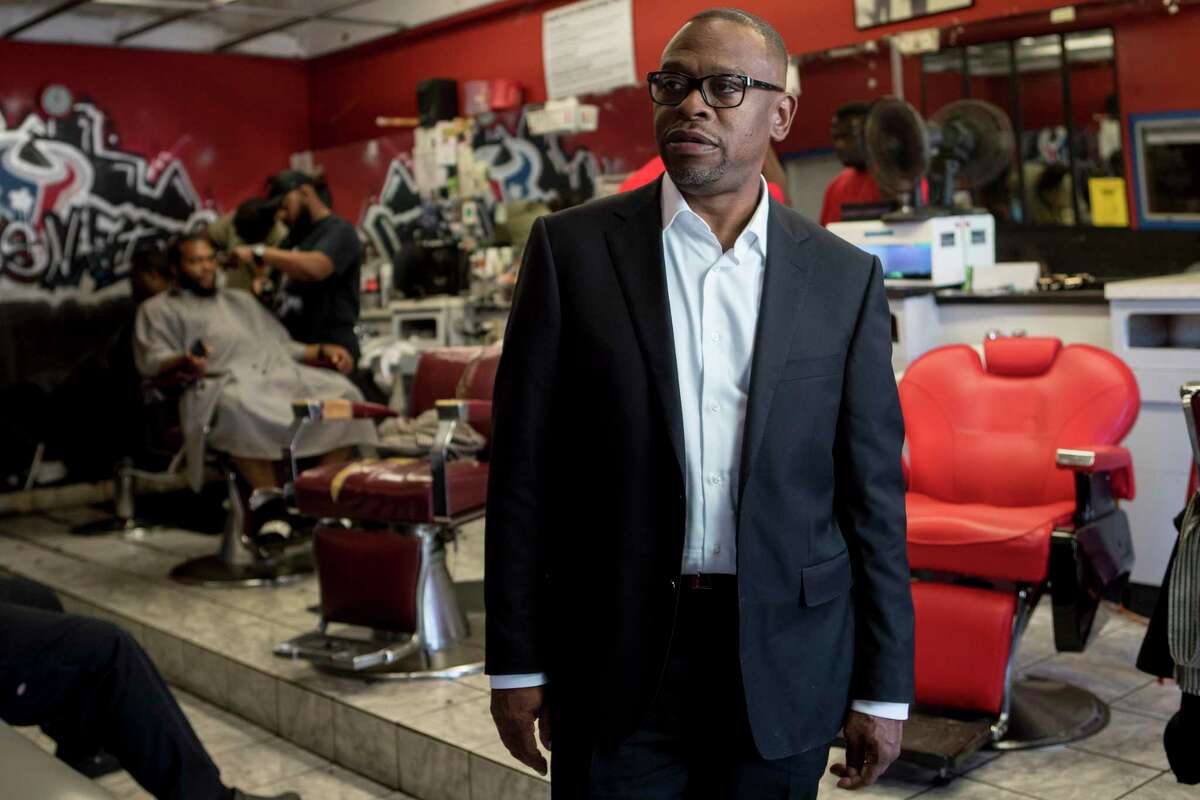 Brad Jordan, who has for 30 years been best known as Scarface, lyricist and rapper in Houston's legendary Geto Boys, talks about his upcoming campaign for city council at South Acres Barber Shop on Thursday, Sept. 5, 2019, in Houston. Jordan plans to run for a vacant city council seat this fall, with a plan to try to turn around things in the neighborhood where he grew up.
