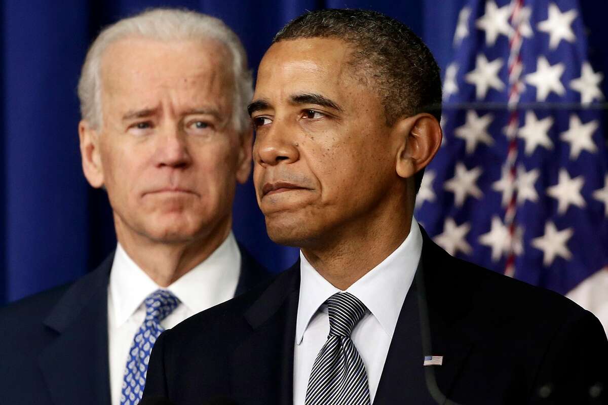 FILE - In this Jan. 16, 2013, file photo, President Barack Obama, accompanied by Vice President Joe Biden, talks about proposals to reduce gun violence at the White House in Washington. Obama has called for a ban on military-style assault weapons and high-capacity ammunition magazines and is pushing other policies in the wake of the mass shooting last month at an elementary school in Newtown, Conn. In response, gun-rights advocates have accused Obama and others of ignoring the Second Amendment rights of Americans. (AP Photo/Charles Dharapak)