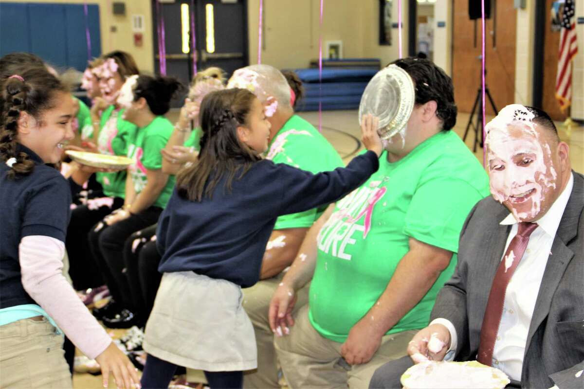 Ansonia educators take a pie or three in the face for breast cancer