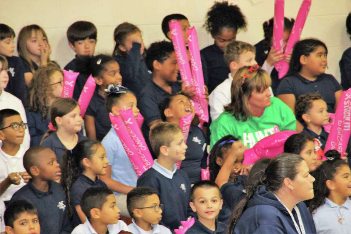 Ansonia educators take a pie or three in the face for breast cancer