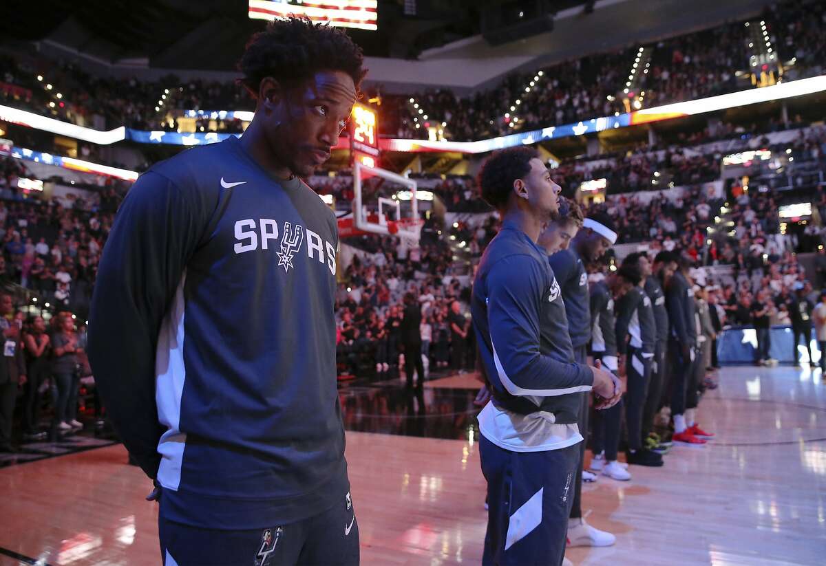 Spurs' DeMar DeRozan (10) joins the players for the national anthem before the pre-season game against the Memphis Grizzlies at the AT&T Center on Friday, Oct. 18, 2019. (Kin Man Hui/San Antonio Express-News)