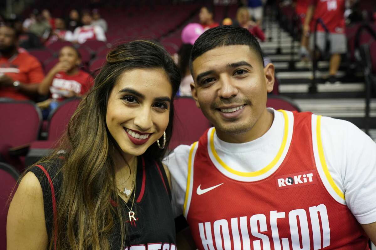 People attend the Houston Rockets NBA game against the Milwaukee Bucks Wednesday, October 24, 2019, in Houston