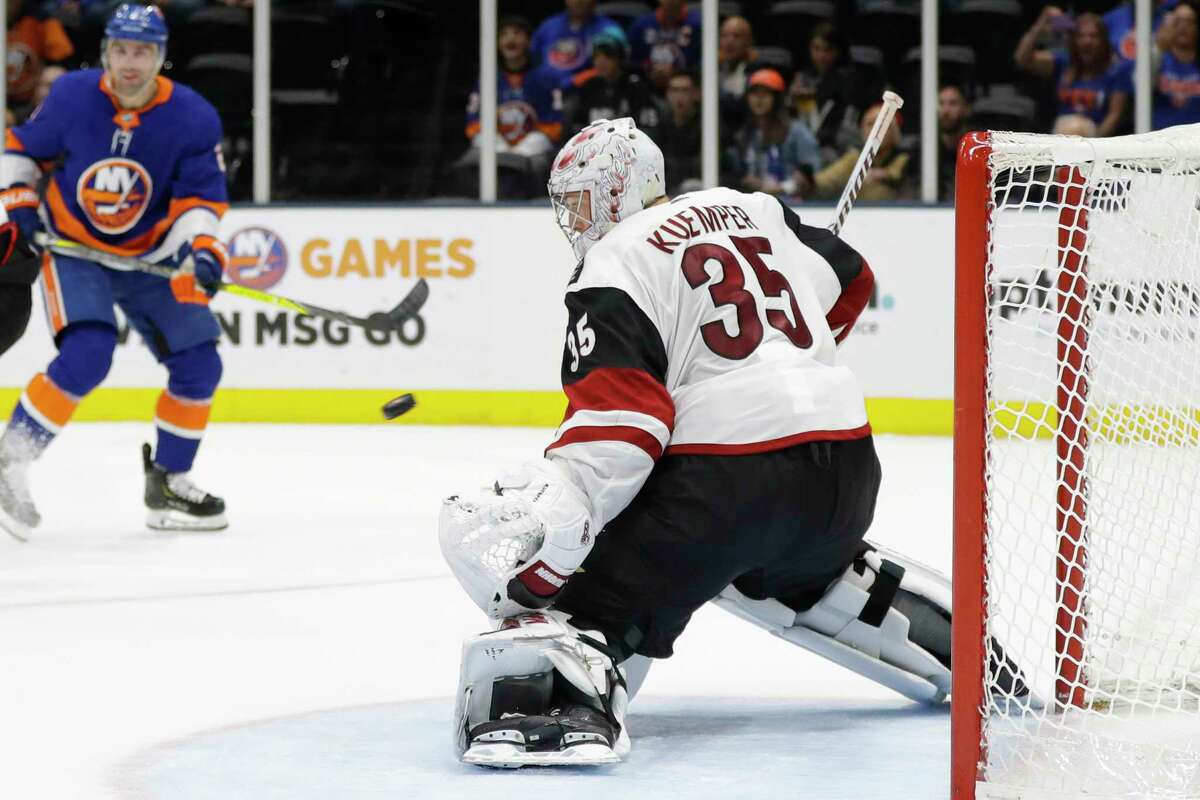 Arizona Coyotes goaltender Darcy Kuemper (35) watches the puck shot by New York Islanders' Josh Bailey for a goal during the second period of an NHL hockey game Thursday, Oct. 24, 2019, in Uniondale, N.Y. (AP Photo/Frank Franklin II)
