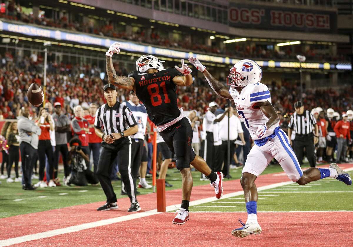 Houston Cougars wide receiver Tre'von Bradley (81) misses a pass while being covered by Southern Methodist Mustangs cornerback Robert Hayes Jr. (7) during the second quarter of an NCAA football game at TDECU Stadium on Thursday, Oct. 24, 2019, in Houston.