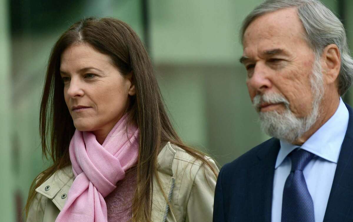 Michelle Troconis and her attorney, Andrew Bowman, arrive Friday for a pre-trial hearing at the Stamford courthouse.