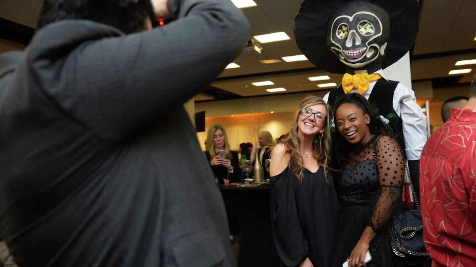 Guests pose for a picture at the Houston Chronicle 2019 Culinary Stars event.