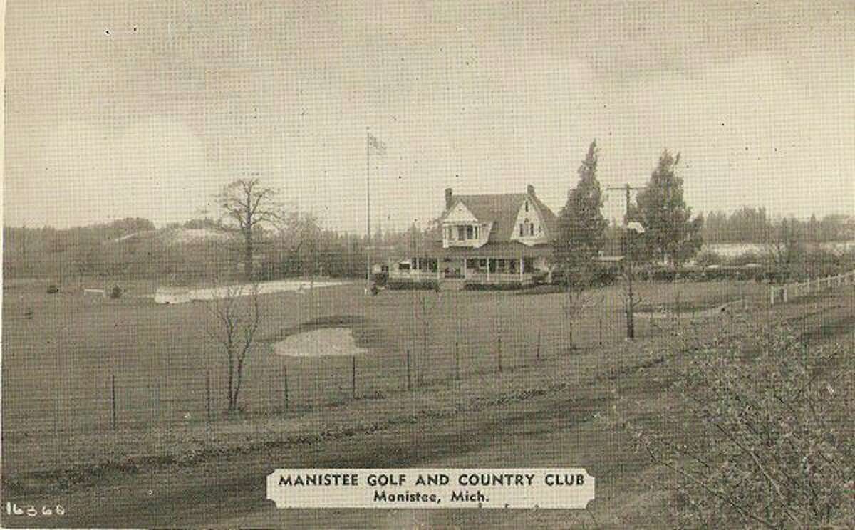 The Manistee Golf and Country Club is shown in this photo during the early 1900s when Cherry Road that runs in front of it wasn't even a paved road at that time.