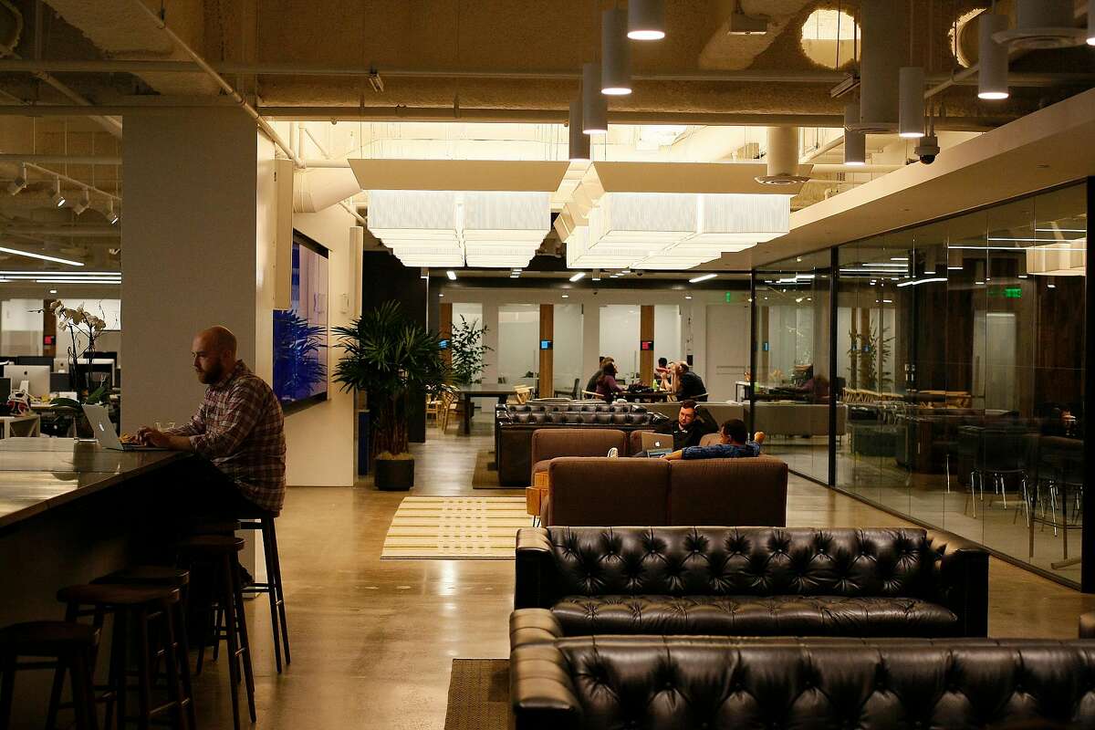Uber employees work away from their desks at their new office in San Francisco, Calif. on Friday, May 30, 2014. This is Uber's seventh move.