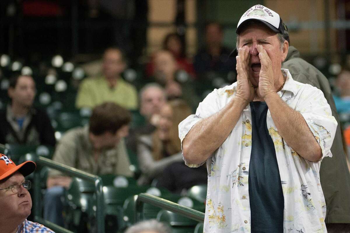 Jerry Peacock shouts encouragement to his son, Houston Astros starting pitcher Brad Peacock after he set down the Oakland Athletics in order during the fourth inning at Minute Maid Park on Friday, April 5, 2013, in Houston. ( Smiley N. Pool / Houston Chronicle )