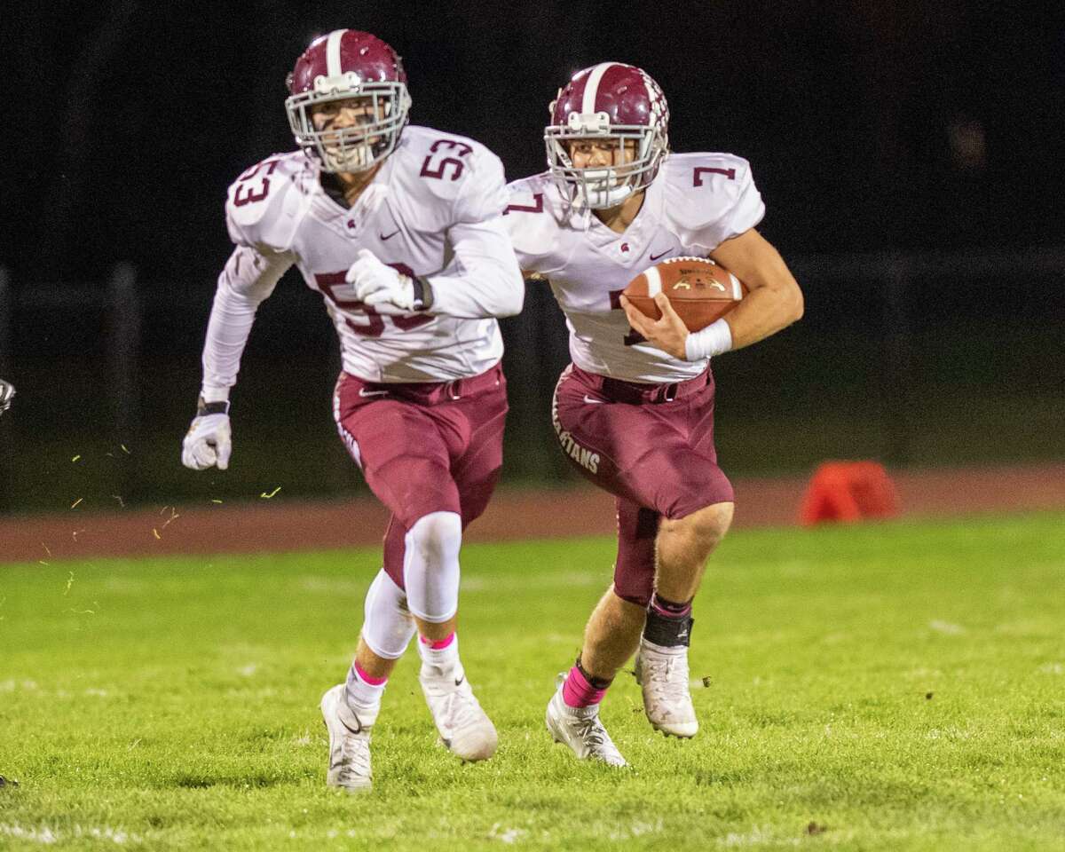 Burnt Hills Ballston Lake running back Caeden LaPietro follows blocker Justin Gray during the during the Section II Class A quarterfinal football game against Averill Park at Averill Park High School on Friday, Oct. 25, 2019 (Jim Franco/Special to the Times Union.)