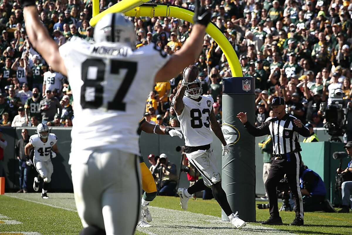 Raiders tight end Foster Moreau (87) moves into position prior to a play  during the second quar …