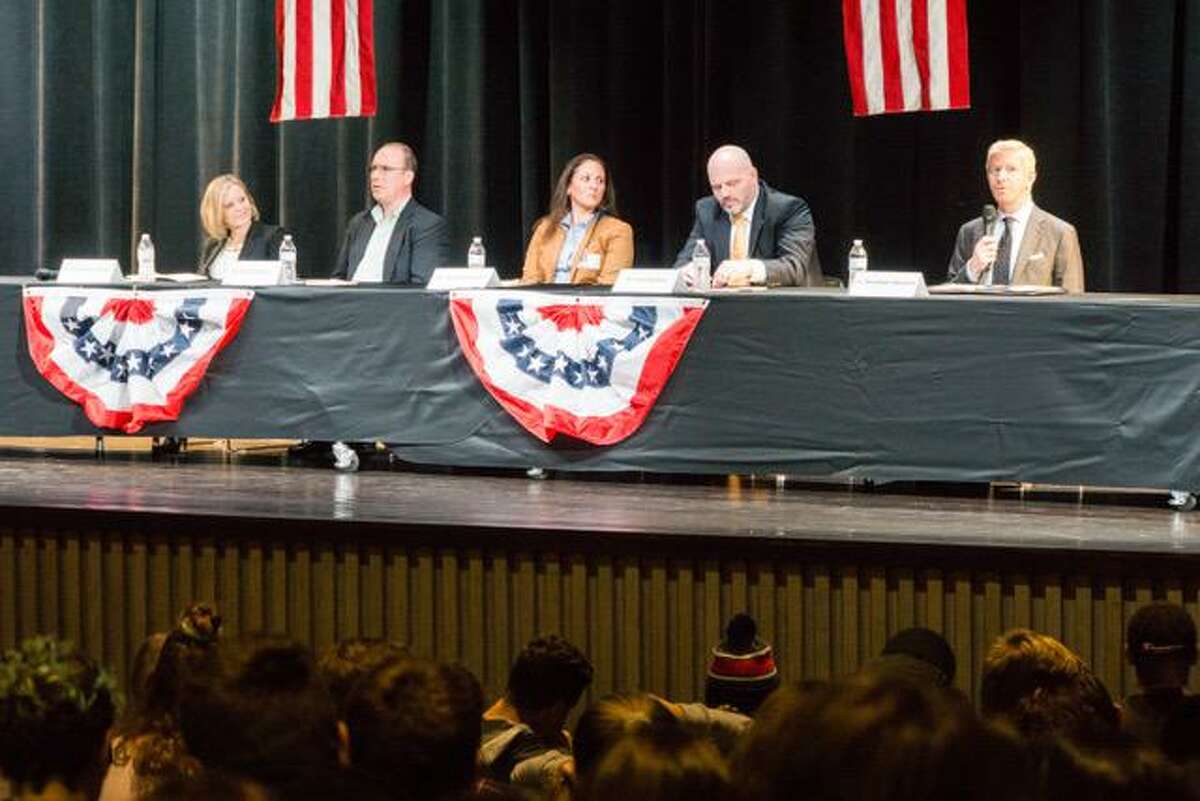 Board of Education candidates answer questions from Ridgefield High School seniors during the mock debate at the high school on Oct. 22.