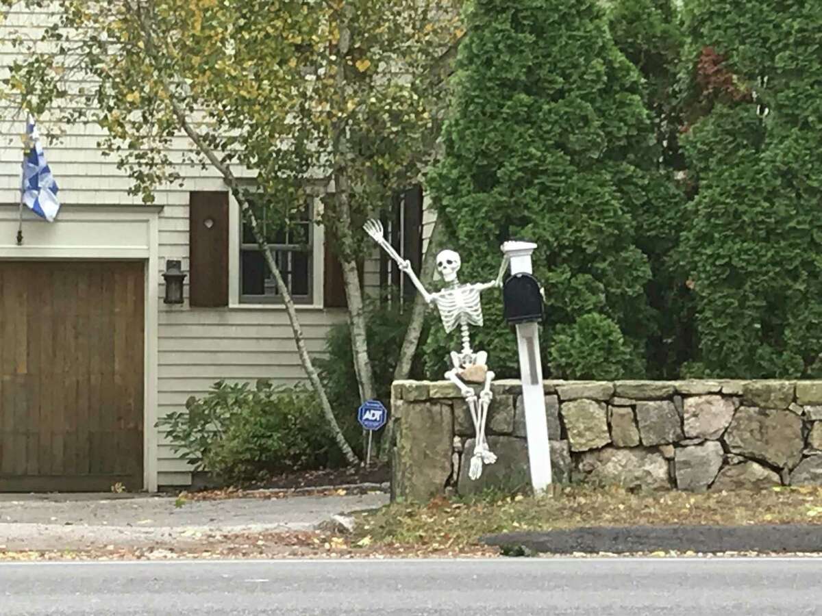 A Halloween 'spirit' greets drivers on the Post Road in Darien.