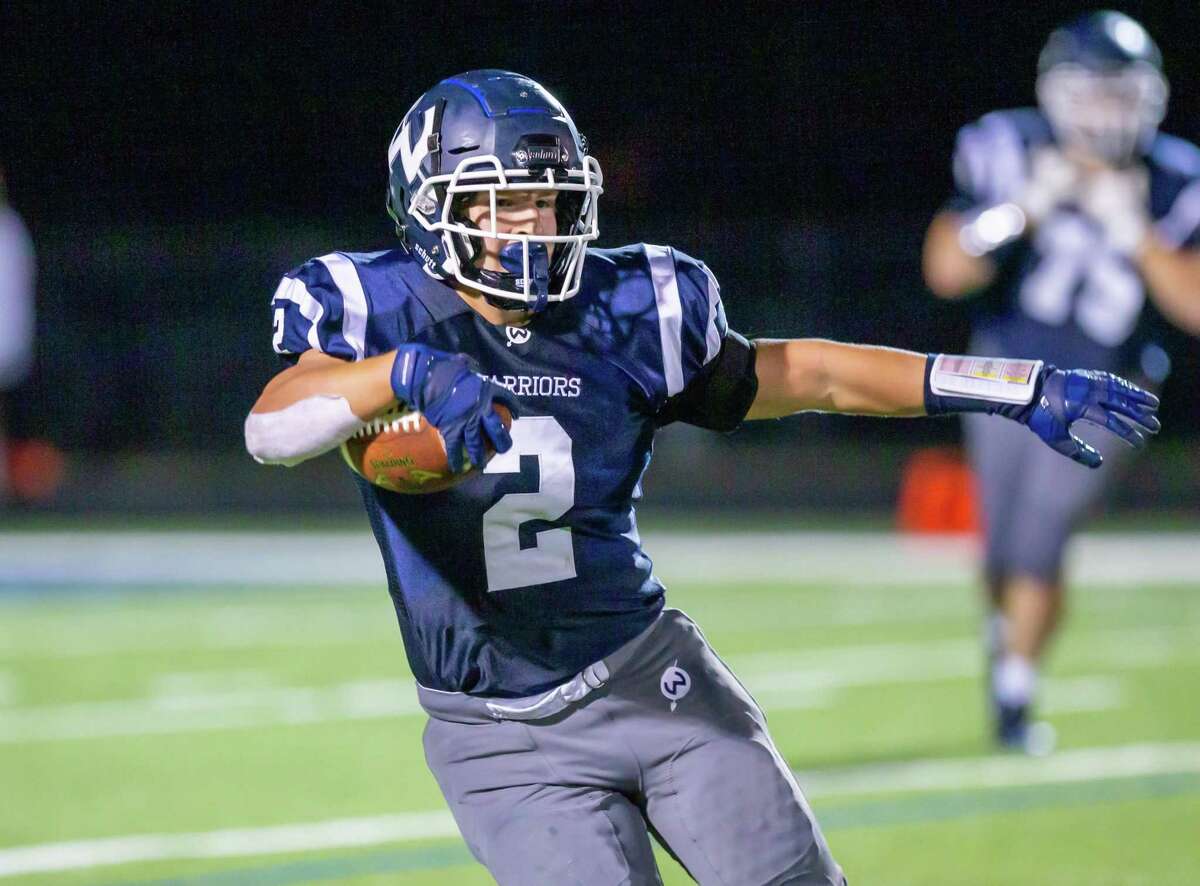 Drew Phillips (shown earlier this season) scored three touchdowns in Wilton's 45-14 win over Bunnell.