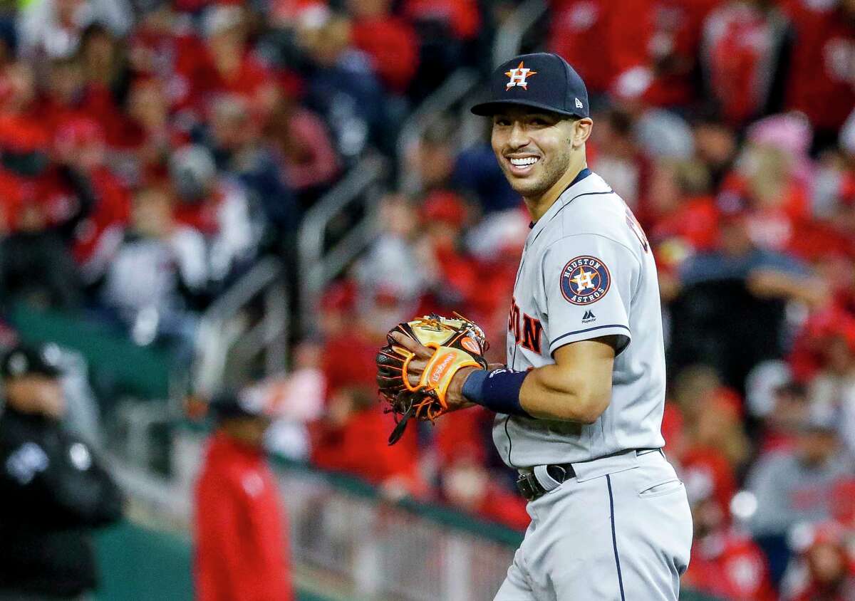 Astros fans woke up Monday morning with the same smile Carlos Correa gave in this photo during the 2019 World Series. Some signs are pointing to the free agent shortstop remaining in Houston for at least another year.