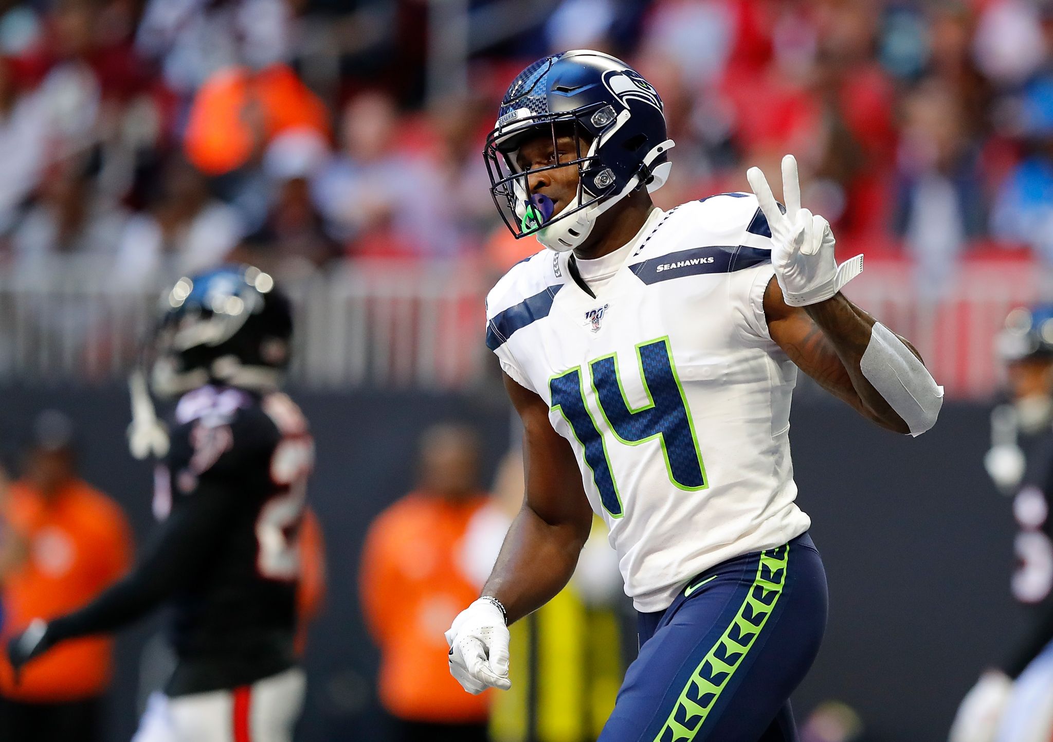 Wide receiver DK Metcalf of the Seattle Seahawks celebrates after