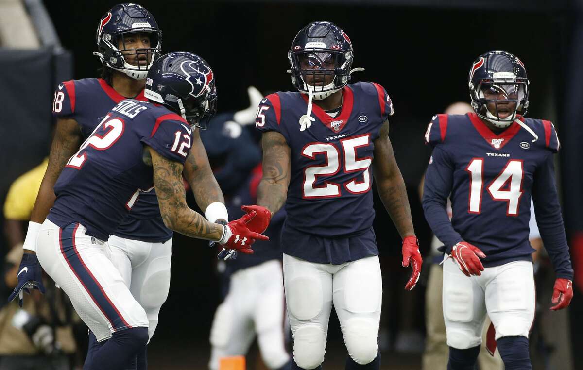 Houston Texans running back Duke Johnson (25) is congratulated after scoring a touchdown against Oakland Raiders in the first half at NRG Stadium on Sunday, Oct. 27, 2019 in Houston.
