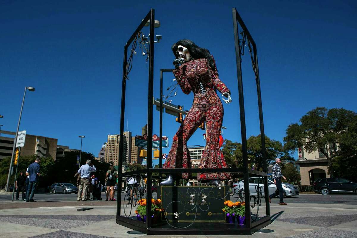 A Selena catrina, created by Huichol Indians, is on display at the corner of South Alamo and West Market streets for the city’s inaugural Day of the Dead festival.
