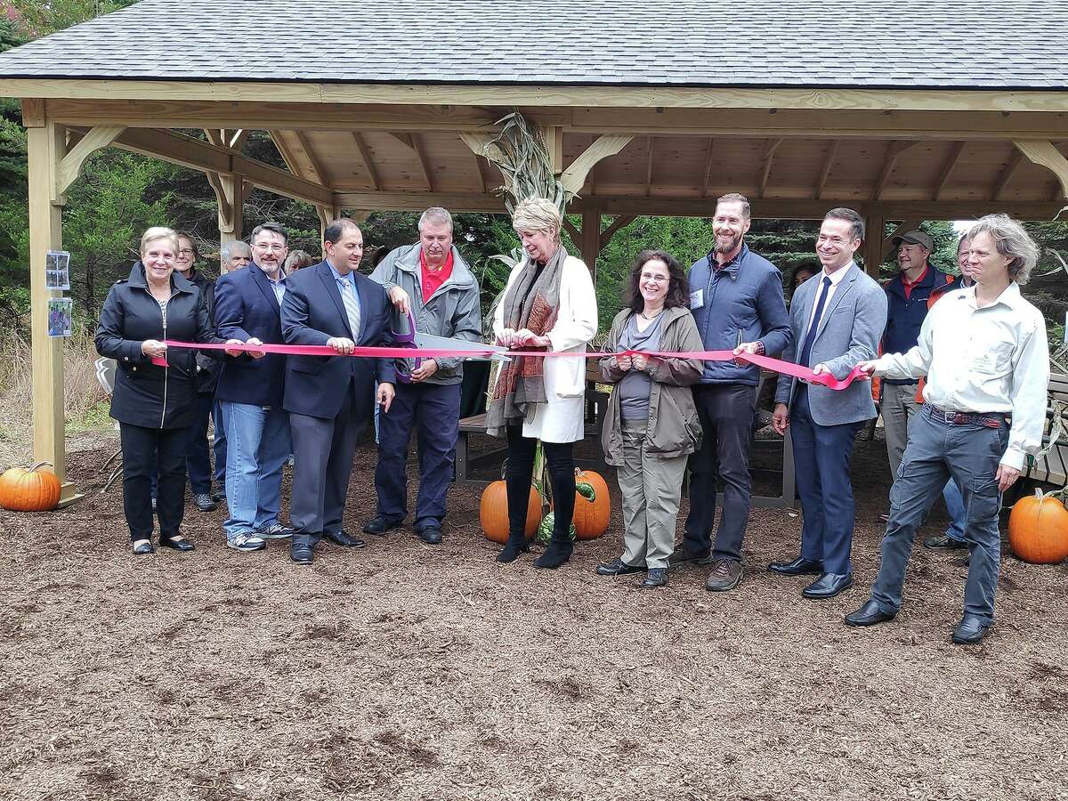 Trumbull First Selectman Vicki Tesoro; Chuck Crawford, head of R&D, Laundry & Home Care, North America Henkel Corporation; Dan Onofrio, president and CEO of Bridgeport Regional Business Council; Steve Leeper, facilities manager, Henkel Corporation; State Rep. Laura Devlin; Sheryl Baumann, consulting director, Patrons of the Trumbull Nature & Arts Center; Mark Ceneri, lead educator, Trumbull Nature & Arts Center; Dr. Keith Choate, M.D., Ph.D., Yale School of Medicine; Kevin Malone, president, Patrons of the Trumbull Nature & Arts Center.