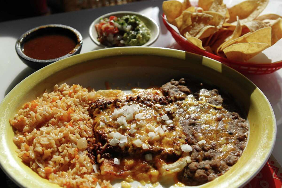 Cheese enchiladas with chili con carne at El Real Tex-Mex Cafe, 1201 Westheimer. The restaurant closed on Oct. 27.