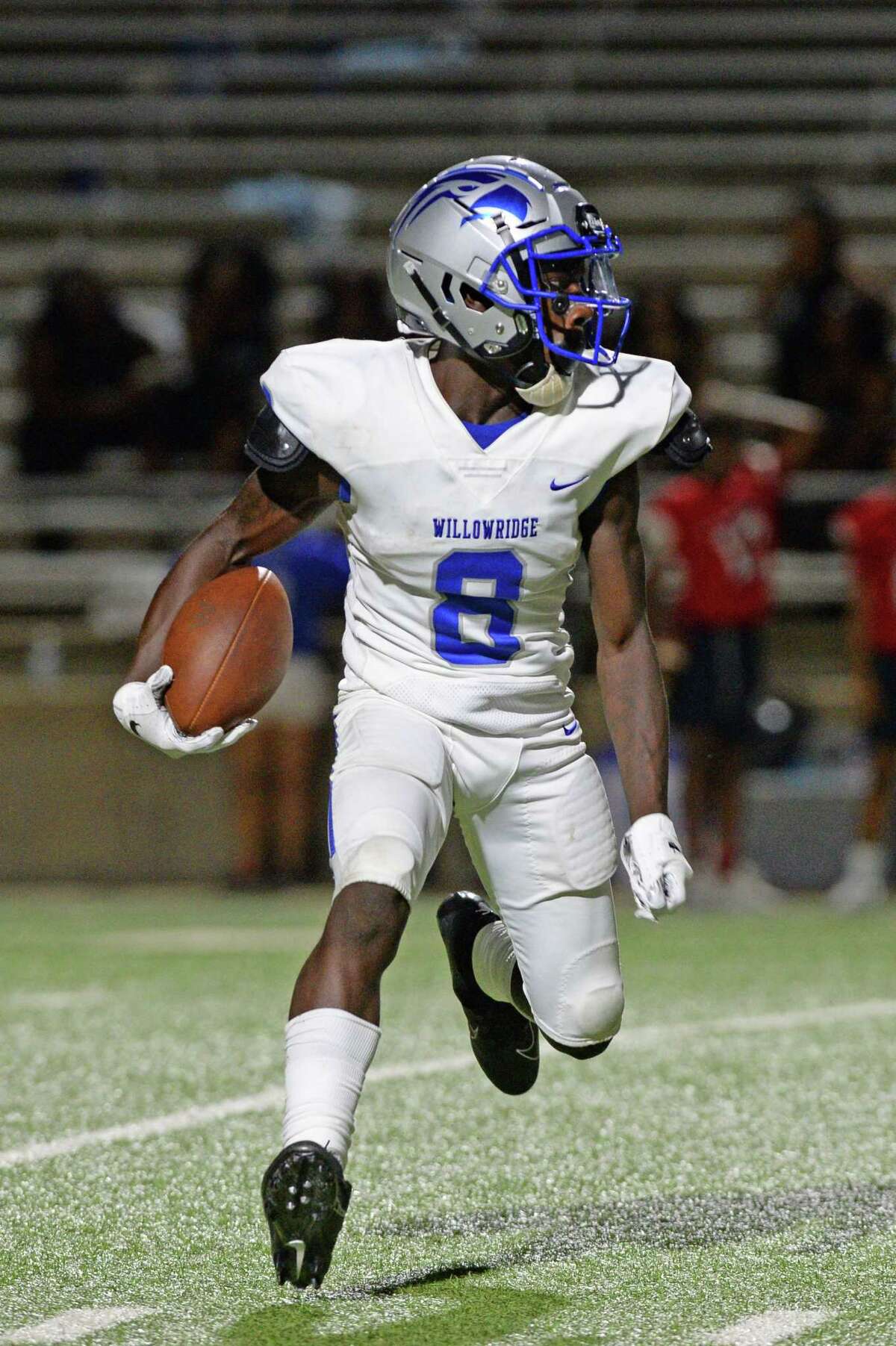 Javion Chatman (8) of Willowridge carries the ball in the fourth quarter of a high school football game between the Dulles Vikings and the Willowridge Eagles on Friday, August 30, 2019 at Mercer Stadium, Sugar Land, TX.