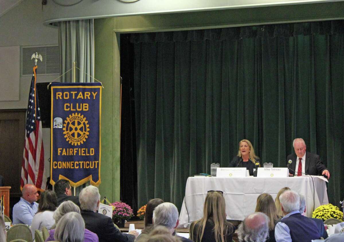 Brenda Kupchick and Mike Tetreau debated at the Rotary Club's First Selectman candidate forum Monday.