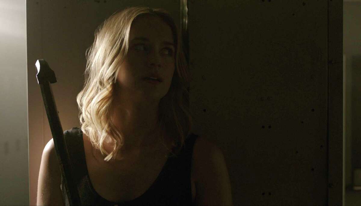 This image released by STXfilms shows Elizabeth Lail in a scene from "Countdown." (STXfilms via AP)