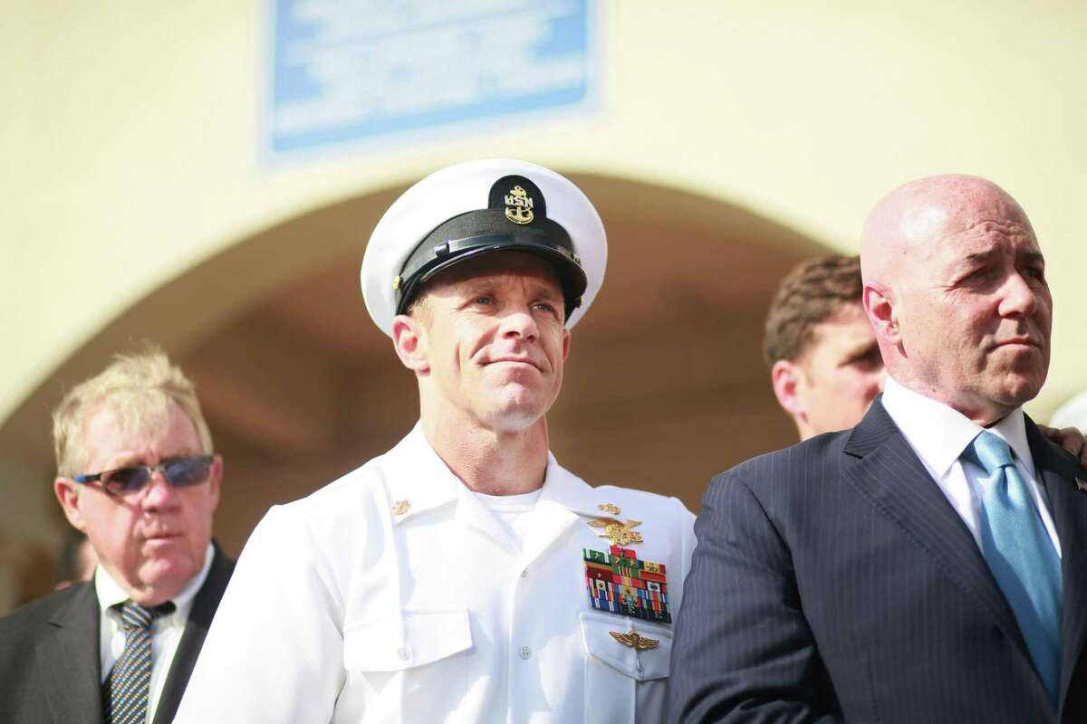 Navy Special Operations Chief Edward Gallagher celebrates after being acquitted of premeditated murder at Naval Base San Diego July 2, 2019 in San Diego, California. Gallagher was found not guilty in the killing of a wounded Islamic State captive in Iraq in 2017. He was cleared of all charges but one of posing for photos with the dead body of the captive.
