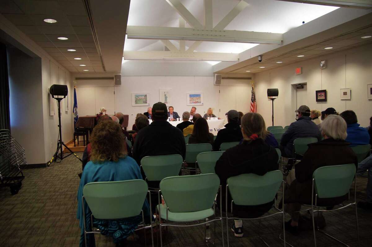 Weston residents gather in attendance for the Police Commission debate at the Weston Library on Oct. 19.