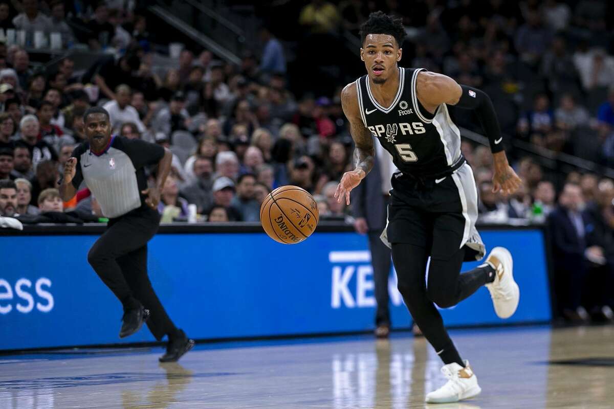 San Antonio Spurs' Dejounte Murray drives the ball down the court as the Spurs host the Portland Trail Blazers at AT&T Center San Antonio, Texas, on Oct. 28, 2019.