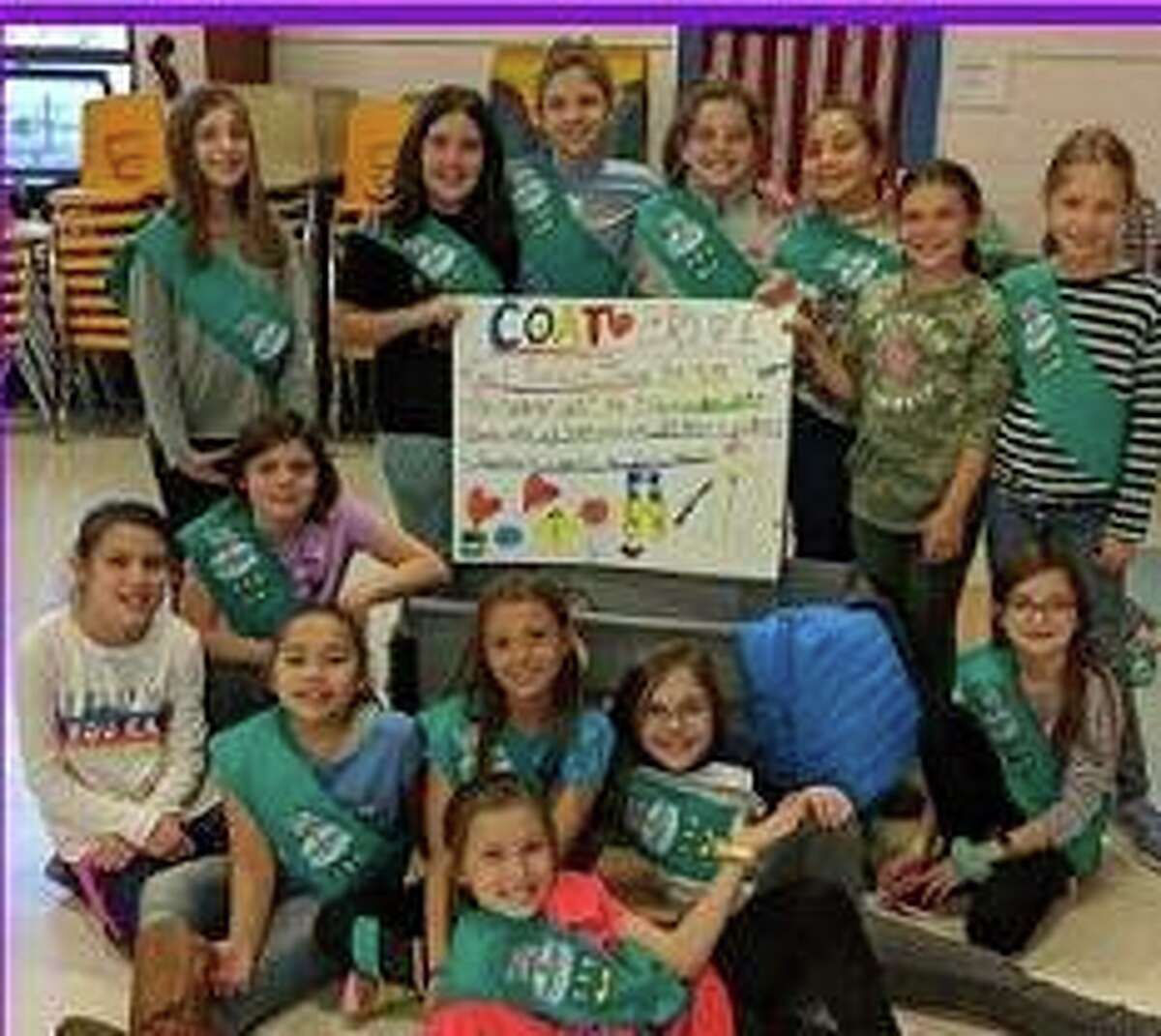 Girl Scout Troop 3410, made of fourth graders from Monroe Elementary School, is collecting coats, jackets, snow suits and snow pants for the needy.