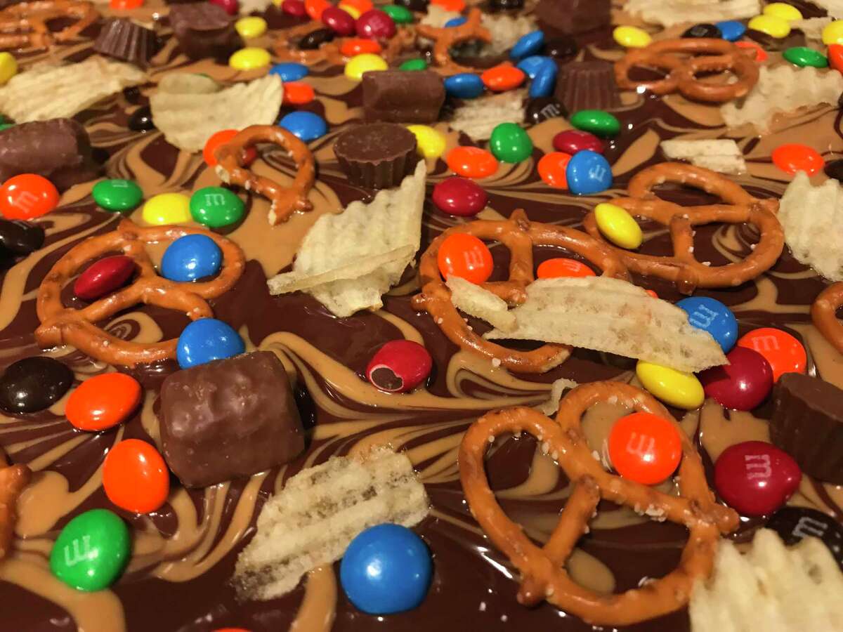 Looking for a creative way to use up leftover Halloween candy? Try this sweet and salty bark recipe.